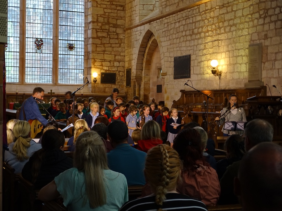 Hallbankgate Village School children and teachers in Lanercost Priory