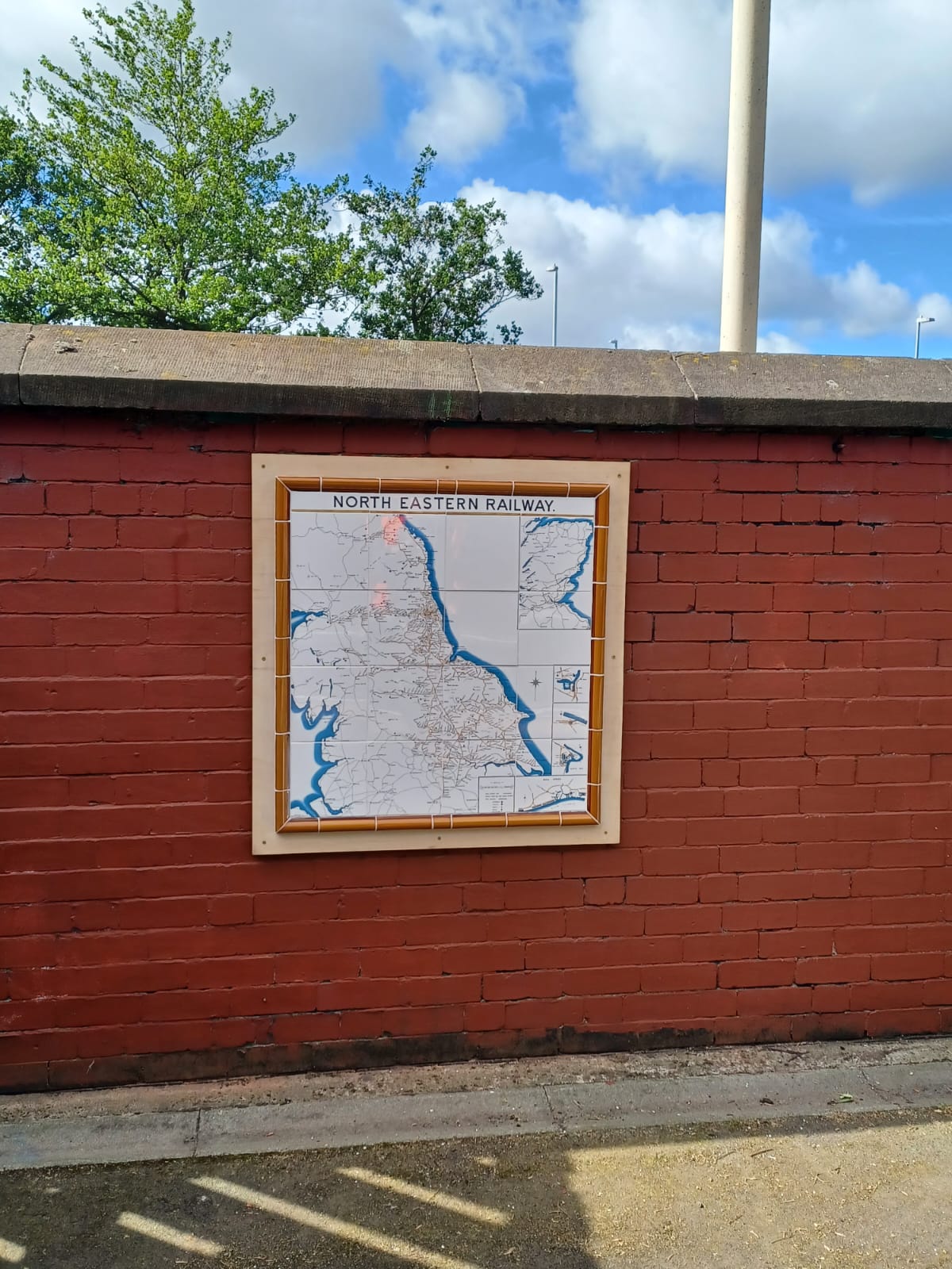 The NER map installed on the wall at the station